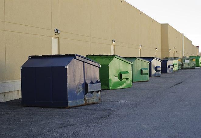 dumpsters lined up waiting to be filled with construction waste in Bentonville